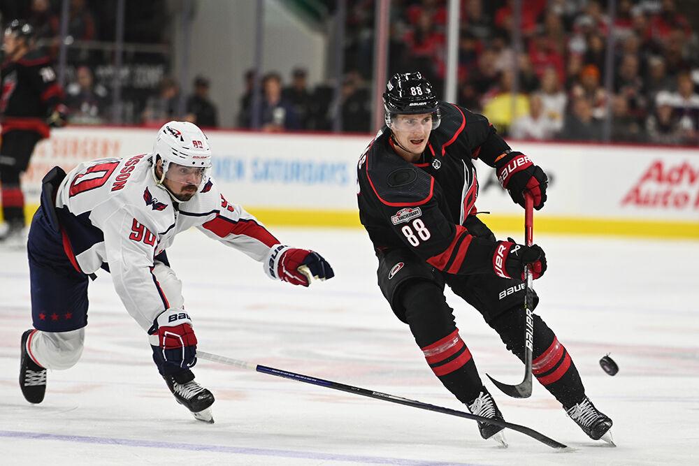 Carolina Hurricanes center Martin Necas passes the puck during the game against the Washington Capitals on Monday, Oct. 31, 2022 in PNC Arena. The Hurricanes beat the Capitals 3-2.