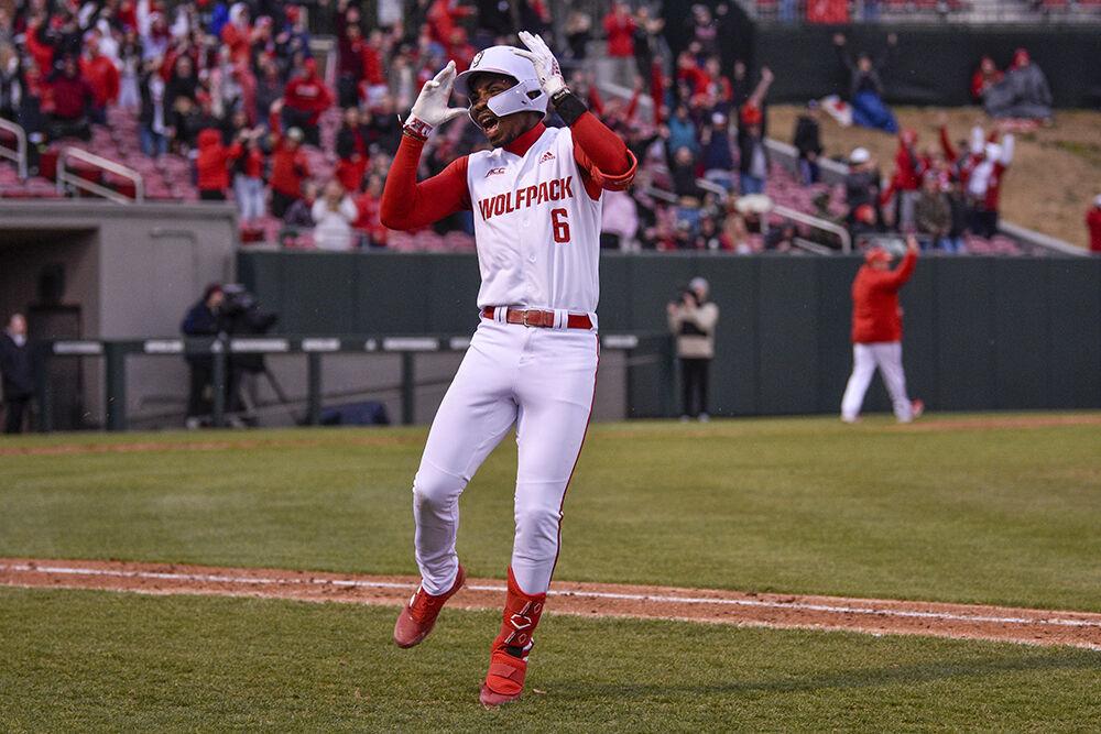 Sophomore infielder Lujames Groover III celebrates his extra innings walk-off home run in the Wolfpack's home baseball game against the Quinnipiac Bobcats at Doak Field on Feb. 26, 2022.&#160;The Wolfpack beat the Bobcats 12-10 to win the series.