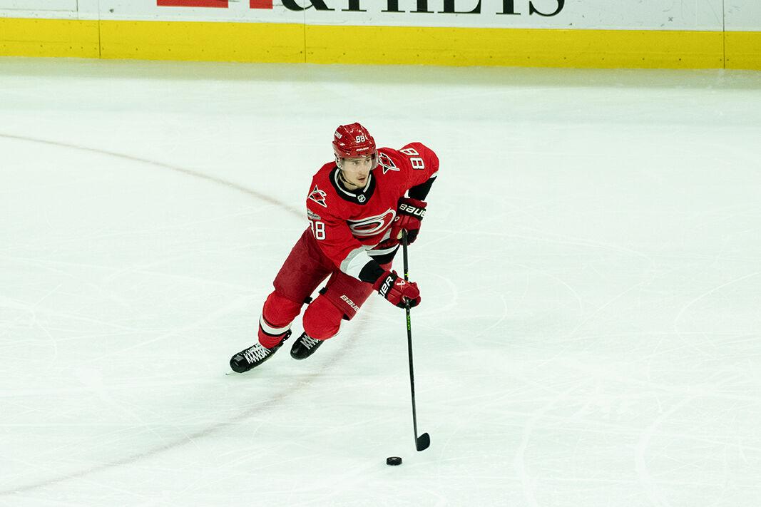 Center Martin Necas dribbles the puck during the game versus Minnesota at PNC Arena on Thursday, Jan. 19, 2023. Necas scored one goal and made one assist. The Hurricanes beat the Wild 5-2.