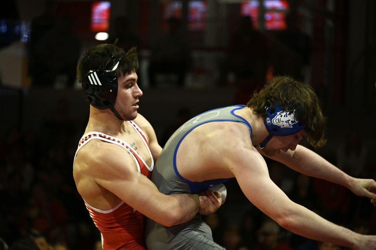 Sophomore Ryan Jack holds his opponent during the NC State duel against Duke in Reynolds Coliseum on Friday, Jan. 27, 2023. Jack won his individual match 13-4. NC State beat Duke 46-3.
