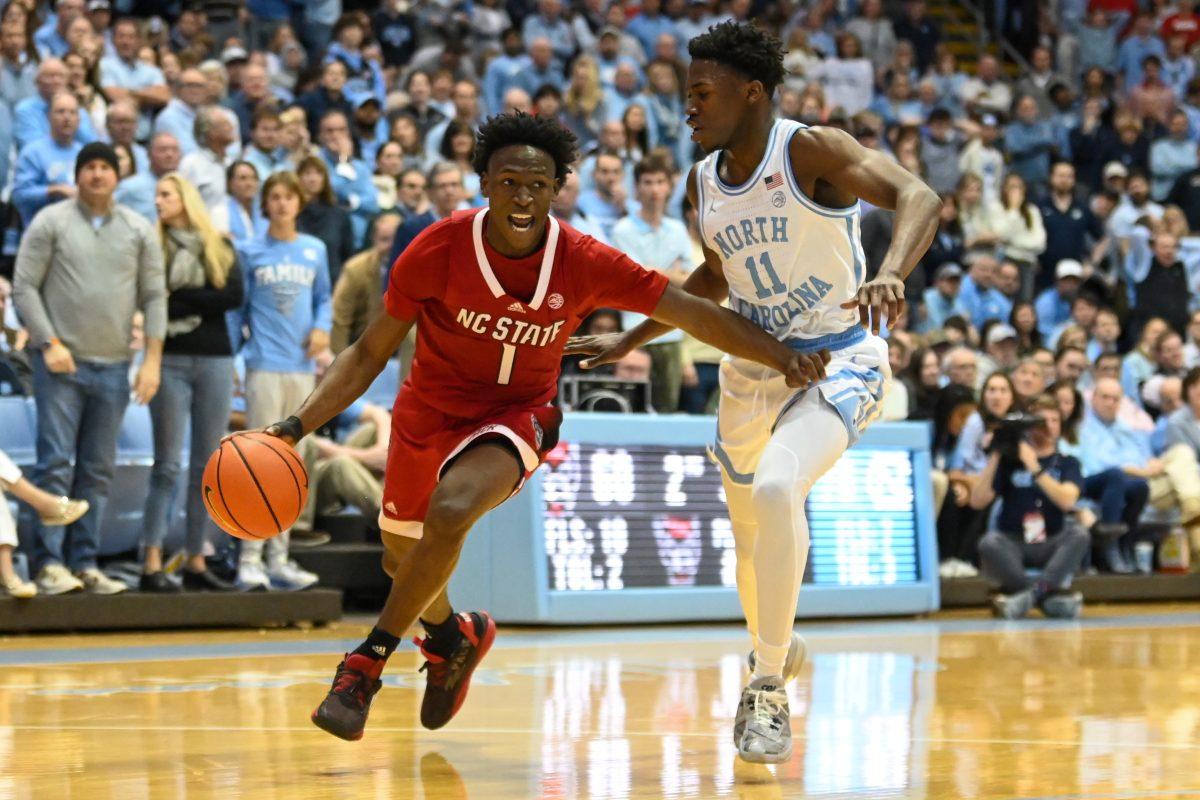 Graduate guard Jarkel Joiner drives to the basket during the game against UNC-Chapel Hill in the Dean E. Smith Center on Saturday, Jan. 21, 2023. Joiner had 18 points. The Wolfpack lost to the Tar Heels 80-69.