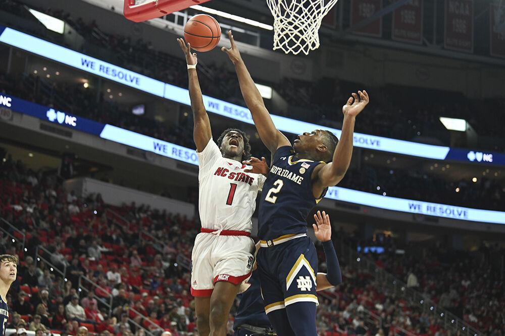 Graduate guard Jarkel Joiner jumps up for a layup during the Wolfpack's game agianst the Notre Dame Fighting Irish at PNC Arena on Tuesay, Jan. 24, 2022. Joiner shot for 28 points and got six rebounds as the Wolfpack beat the Fighting Irish 85-82.