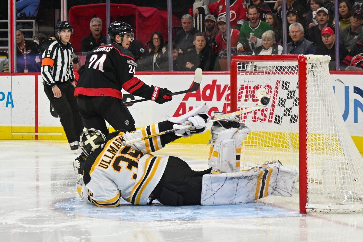 Carolina Hurricanes center Seth Jarvis scores a goal during the game against the Boston Bruins in PNC Arena on Sunday, Jan. 29, 2023. Jarvis had one goal during the game. The Hurricanes beat the Bruins 4-1.