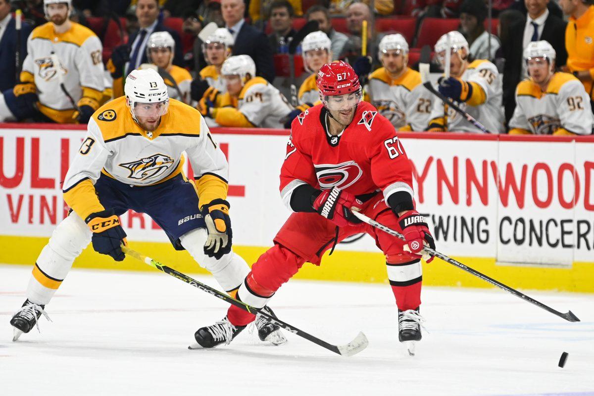 Left wing Max Pacioretty reaches for the puck during the game against the Nashville Predators at PNC Arena on Thursday, Jan. 5, 2023. The Hurricanes lost 5-3.