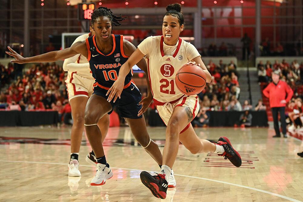 Junior guard Madison Hayes drives the ball to the basket during the game against Virginia in Reynolds Coliseum on Sunday, Jan. 8, 2023. Hayes scored nine points and made seven blocks for the Wolfpack. NC State beat Virginia 87-62.