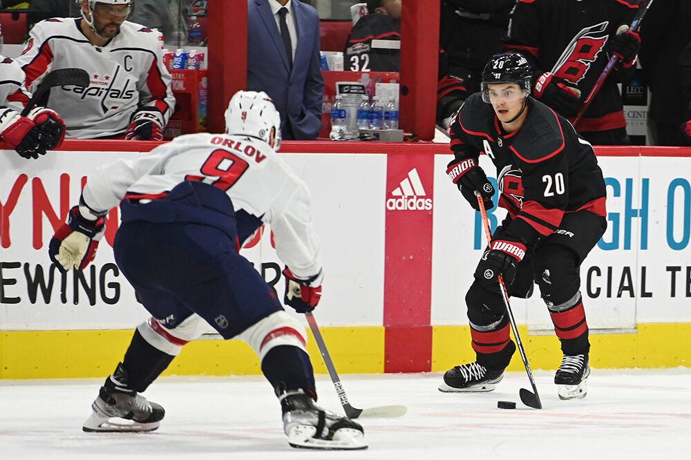 Carolina Hurricanes center Sebastian Aho dribbles the puck during the game against the Washington Capitals on Monday, Oct. 31, 2022 in PNC Arena. The Hurricanes beat the Capitals 3-2.