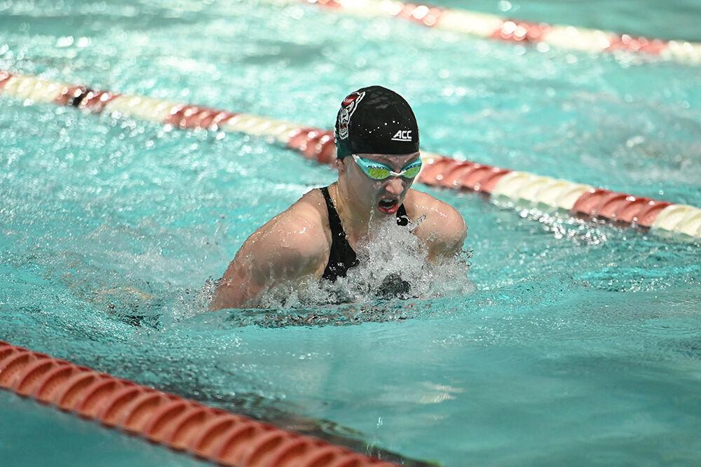 Sophomore Kaylee Hamblin competes in the women's 100 yard breaststroke during the NC State Wolfpack's swim and dive meet against the UNC-Wilmington Seahawks at the Willis R. Casey Aquatics Center on Friday, Jan. 27, 2023. The Wolfpack women beat the Seahawks 186-105.