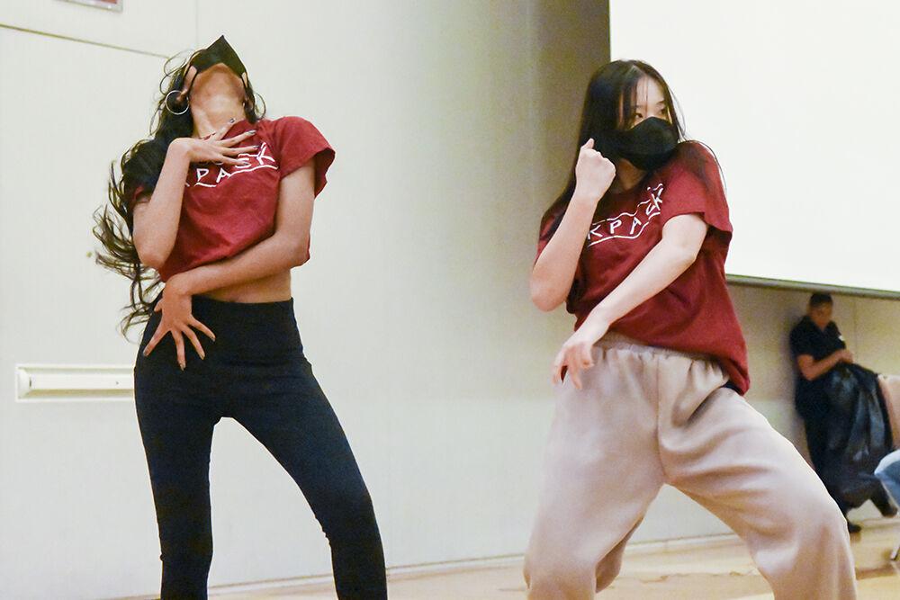 (Left to right) Iniya Gnanakkumaran, a fourth-year studying mechanical engineering, and Felicia Kandinata, a graduate student studying biomanufacturing, dance during the Lunar New Year celebration on Jan. 25, 2023, in Talley Student Union. Gnanakkumaran and Kandinata are both members of KPack, an organization that choreographs and performs dances based on Korean pop (KPOP).