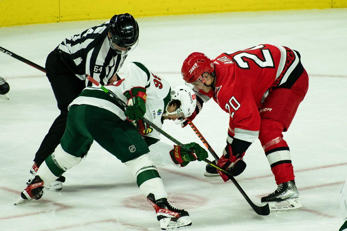 Center Sebastian Aho faces off against opponent during the game versus Minnesota at PNC Arena on Thursday, Jan. 19, 2023. Aho made three shots on the goal. The Hurricanes beat the Wild 5-2.