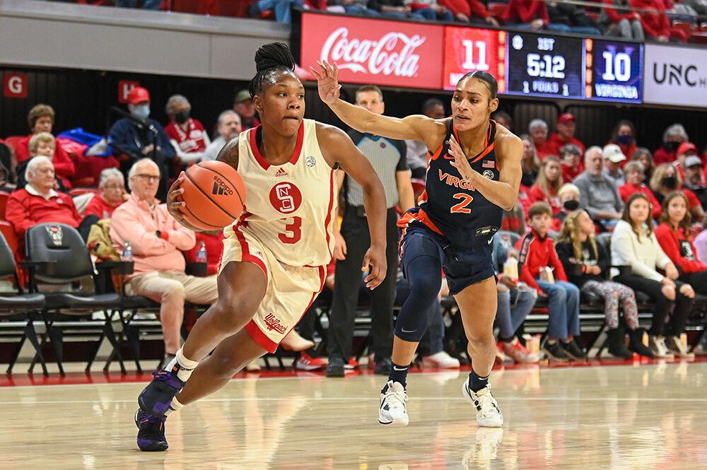 Junior guard Diamond Johnson sprints to the net during the game against Virginia inside Reynolds Coliseum on Sunday, Jan. 8, 2023. Johnson made four rebounds and three assists, while also scoring 10 points for the Pack. NC State won the game 87-62.