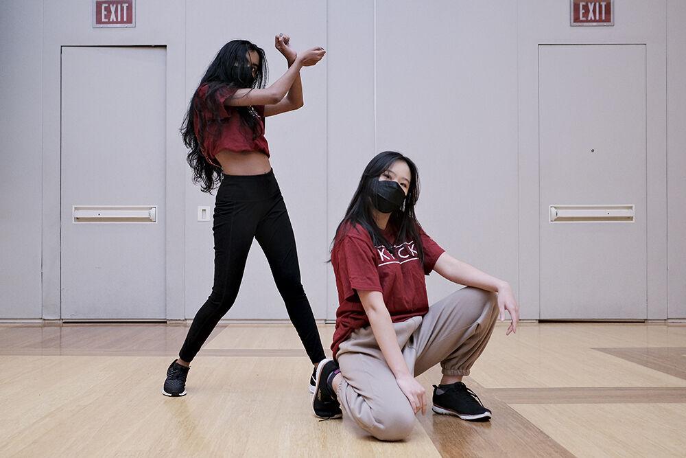 (Left to right) KPack members Iniya Gnanakkumaran, a fourth-year studying mechanical engineering, and Felicia Kandinata, a gradute student studying biomanufacturing, perform during the Lunar New Year celebration in Talley Student Union on Wednesday, Jan. 25, 2023. KPack is a organization that performs K-Pop inspired dance routines.