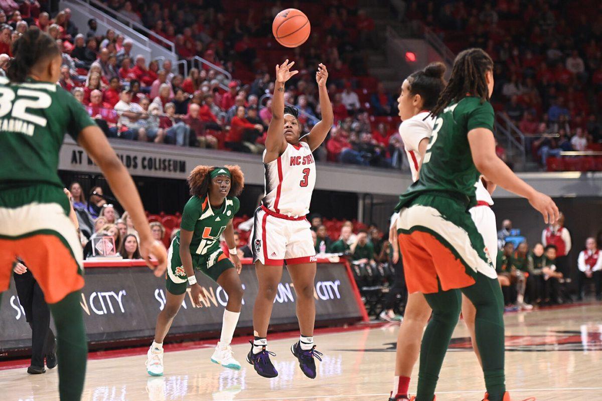 Junior guard Diamond Johnson shoots at the goal versus Miami in Reynolds Coliseum on Thursday, Jan. 19, 2023. Johnson scored seven points in the game against Miami. NC State won 71-61.