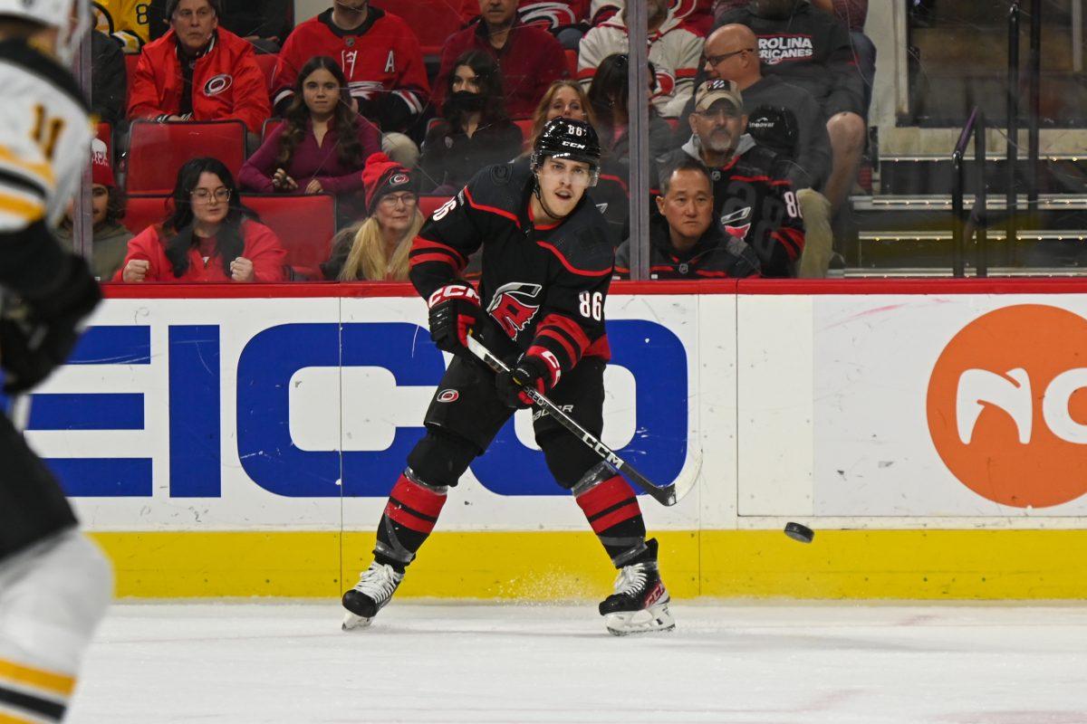 Carolina Hurricanes left wing Teuvo Teravainen passes the puck across the ice during the game against the Boston Bruins in PNC Arena on Sunday, Jan. 29, 2023. The Hurricanes beat the Bruins 4-1.