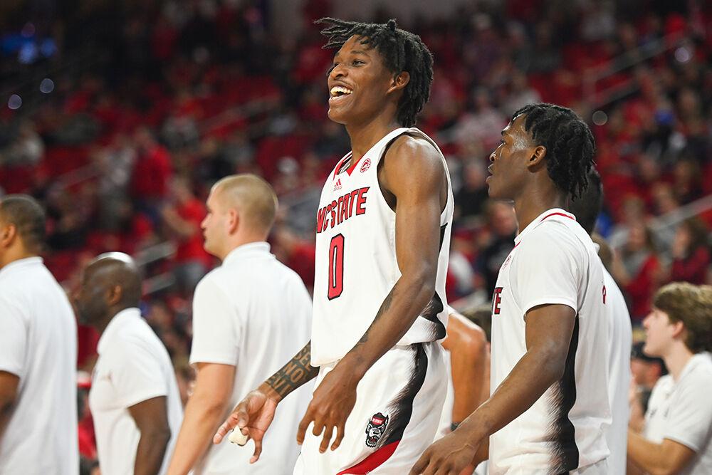 Sophomore guard Terquavion Smith celebrates on the sidelines during the game against Duke in PNC Arena on Wednesday, Jan. 4, 2023. The Wolfpack won 84-60.