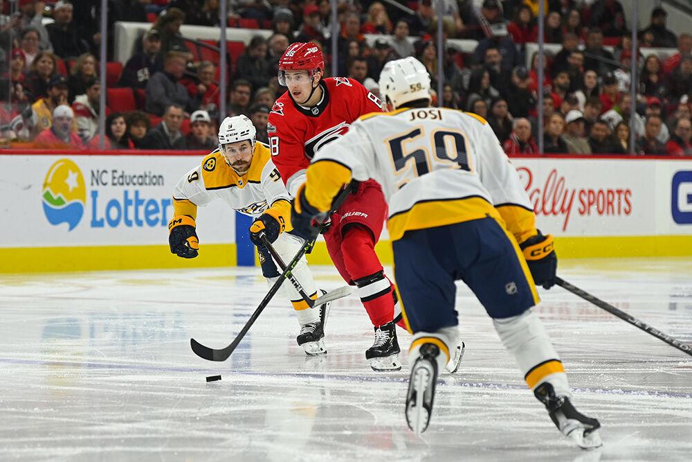 Center Martin Necas dribbles the puck during the game against the Nashville Predators in PNC Arena on Thursday, Jan. 5, 2023. The Hurricanes lost 5-3.