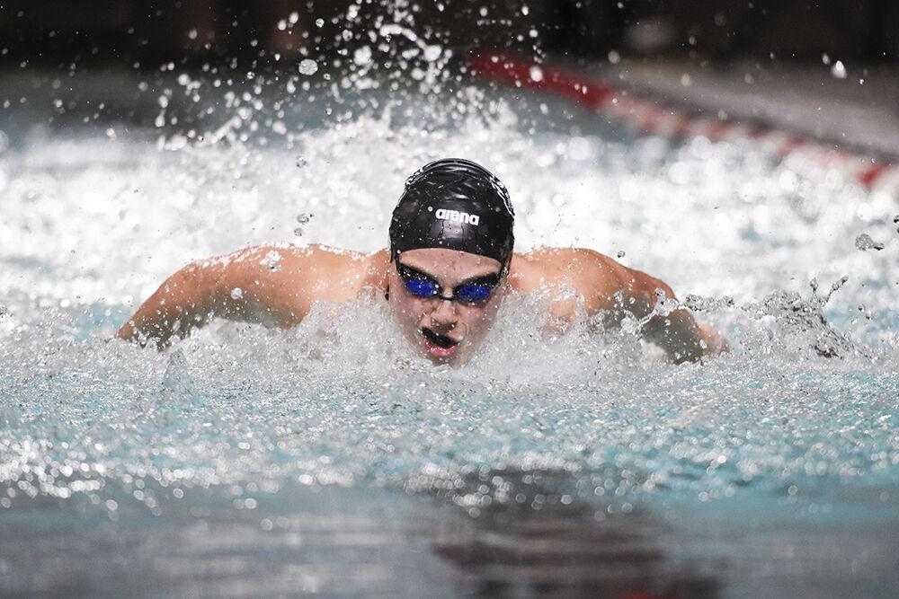 Senior Elle Giesler competes in the women's 100-yard freestyle during the NC State Wolfpack's swim and dive meet against the Kentucky Wildcats on Friday, Oct. 21, 2022 at the Willis R. Casey Aquatics Center. The Pack women beat the Wildcats 172-126.