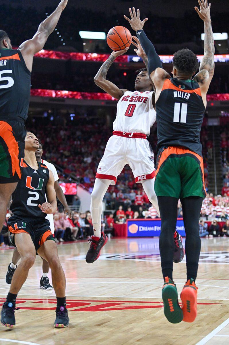 Sophomore guard Terquavion Smith shoots the ball during the game against Miami in PNC Arena on Saturday, Jan. 14, 2023. Smith led NC State in scoring with 20 points. The Wolfpack won 83-81&#160;in overtime.