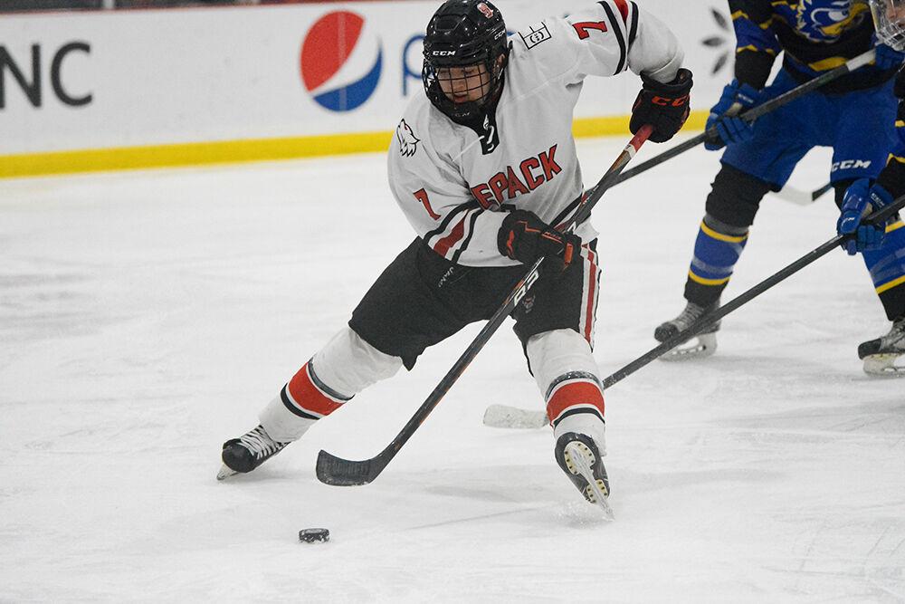 Sophomore forward Zack Robinson shoots and scores a goal in a game against University of Delaware on Friday, Jan. 13, 2023 at Wake Competition Center. The Icepack won against the Hens 7-3.