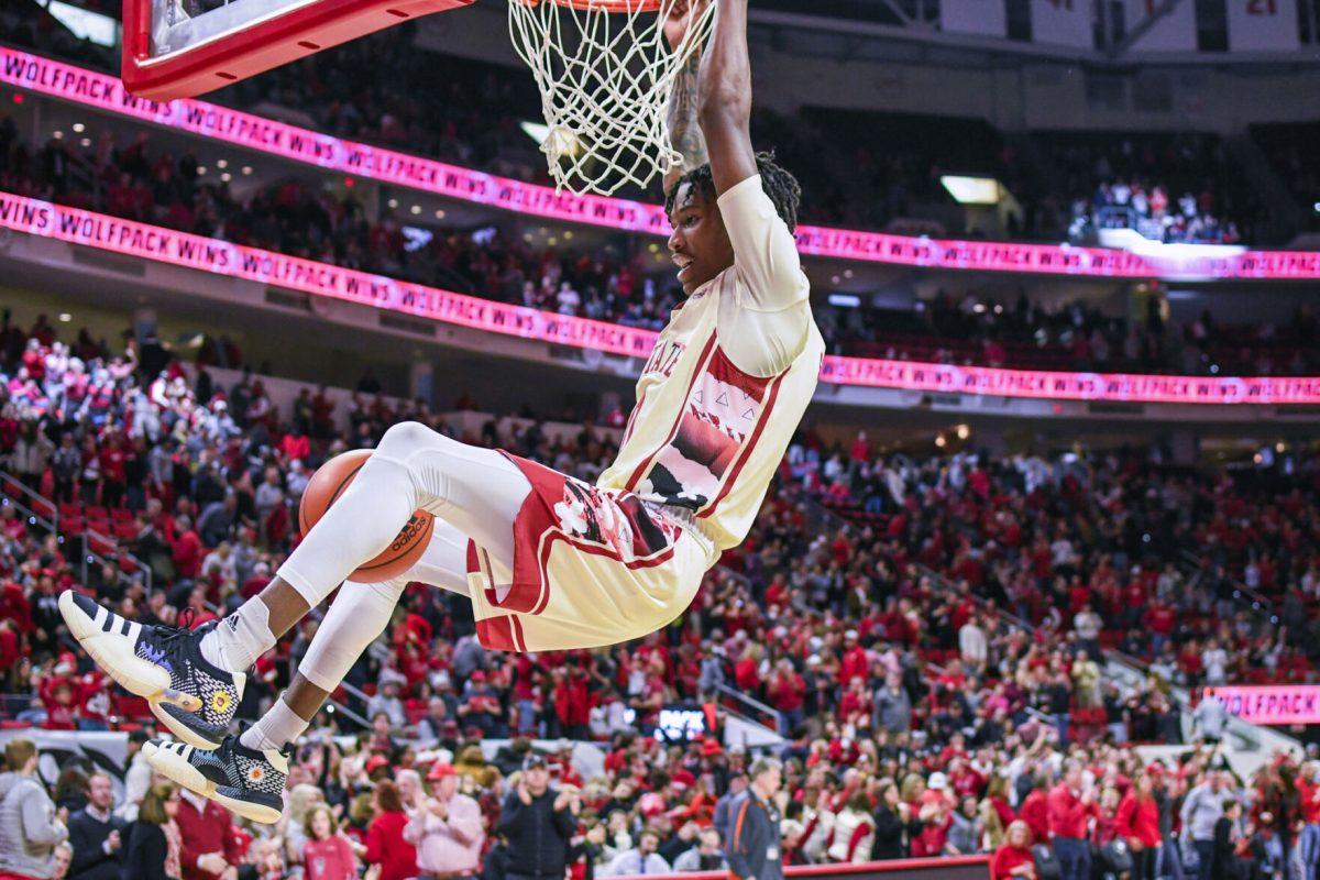 Sophomore guard Terquavion Smith celebrates the Wolfpack win over the Georgia Tech Yellow Jackets at PNC Arena on Saturday, Feb. 4, 2023. Burns scored 24 points against Georgia Tech. The Wolfpack beat the Yellow Jackets 72-64.