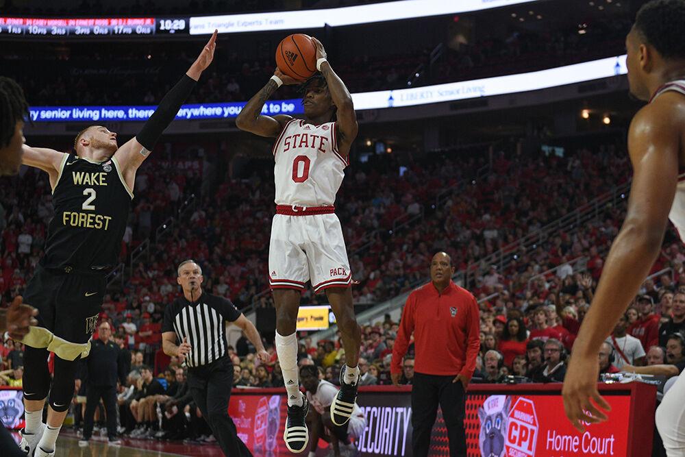 Sophomore guard Terquavion Smith pulls up for a jump shot during the Wolfpack's home game against the Wake Forest Demon Deacons in PNC Arena on Wednesday, Feb. 22, 2023. Smith scored 13 points and had three assists as the Wolfpack beat the Demon Deacons 90-74.