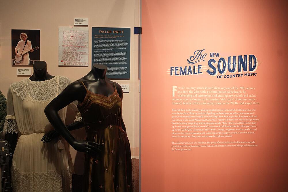 Dresses, boots, a banjo and a set recreation from the 2021 Grammys all highlight Taylor Swift in The Power of Women in Country Music exhibit at the NC Museum of History on Friday, Feb. 3, 2023.