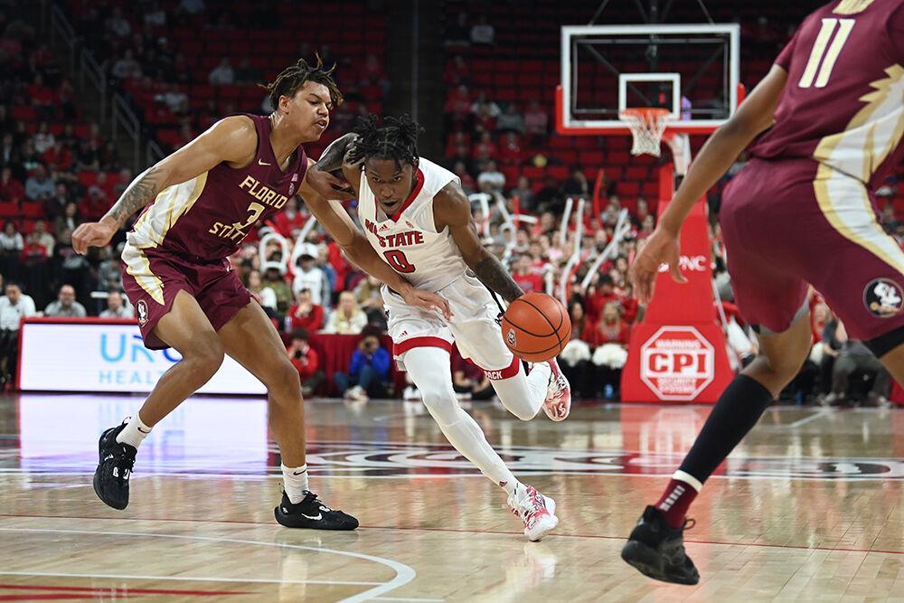 Sophomore guard Terquavion Smith drives to the basket during the Wolfpack's home basketball game against the Florida State Seminoles in PNC Arena on Wednesday, Feb. 1, 2023. Smith scored 32 points and had 5 rebounds as the Wolfpack beat the Seminoles 94-66.