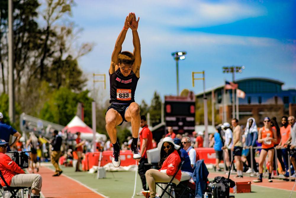 Freshman Jamar Davis competes in the men&#8217;s long jump during the Raleigh Relays on Friday, March 29, 2019 at Paul Derr Track &amp; Field Facility. Davis won second place in the event with a jump of 7.31 meters.