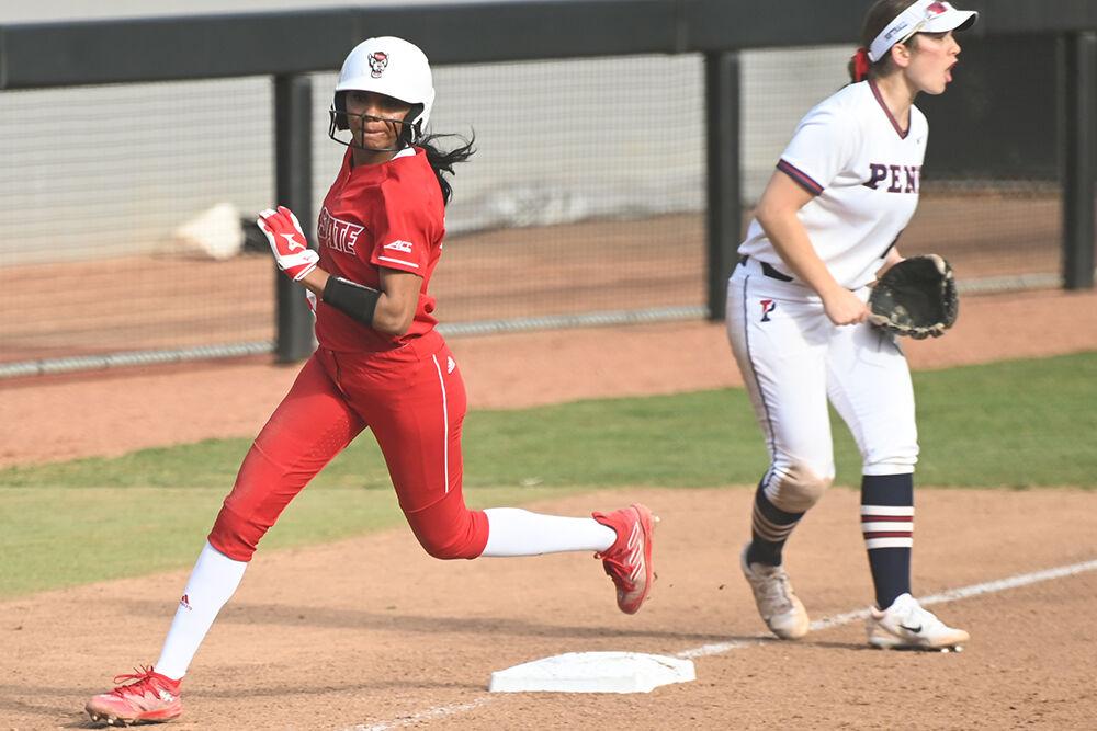 Freshman utility player Makayla Marbury runs through third base during the game against the Penn Quakers at Dail Softball Stadium on Friday, Feb. 24, 2023. Marbury had one hit and one home run during the game. The Wolfpack beat the Quakers 15-6.