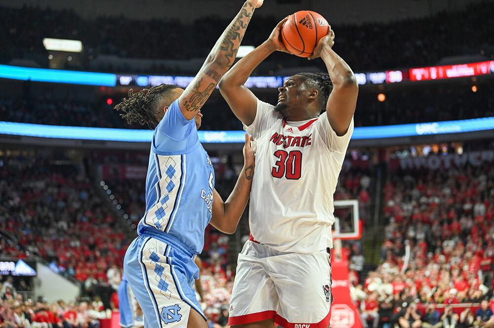 Graduate forward DJ Burns shoots the ball during the game against UNC-Chapel Hill in PNC Arena on Sunday, Feb. 19, 2023. Burns had 18 points for NC State. The Wolfpack beat the Tar Heels 77-69.