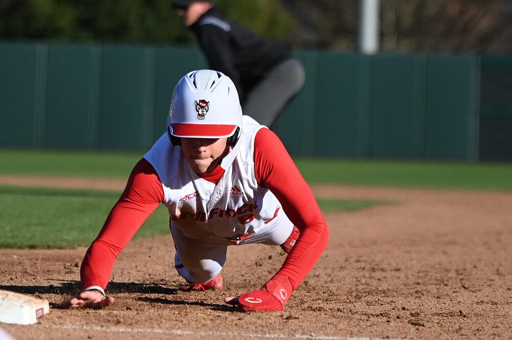 Sophomore infielder Payton Green slides to safety during the game against Wagner at Doak Field in Dail Park on Saturday, Feb. 18, 2023. Saturday was the second game in the Wagner series. NC State beat Wagner 3-2 to win the series.