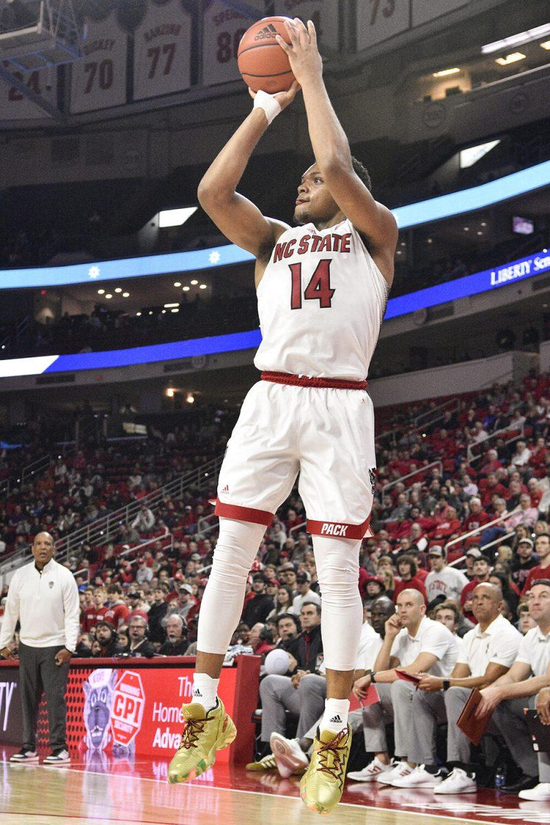 Senior guard Casey Morsell shoots at the goal during the game against the Florida State Seminoles inside PNC Arena on Wednesday, Feb. 1, 2023. Morsell had 10 points with seven rebounds. The Wolfpack won 94-66.