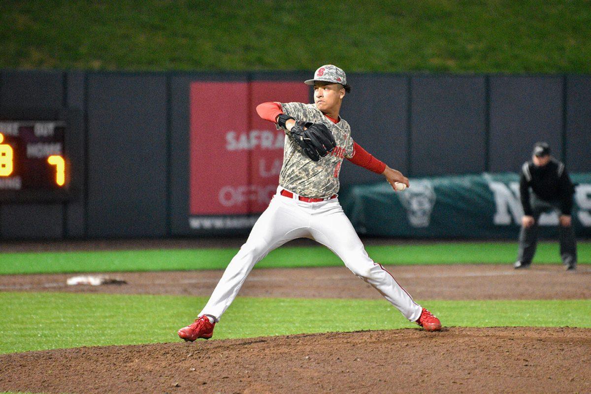 Junior left-handed pitcher Rio Britton pitches against Belmont at Doak Field at Dail Park on Saturday, Feb. 25, 2023. NC State beat Belmont 7-0 to win the series.