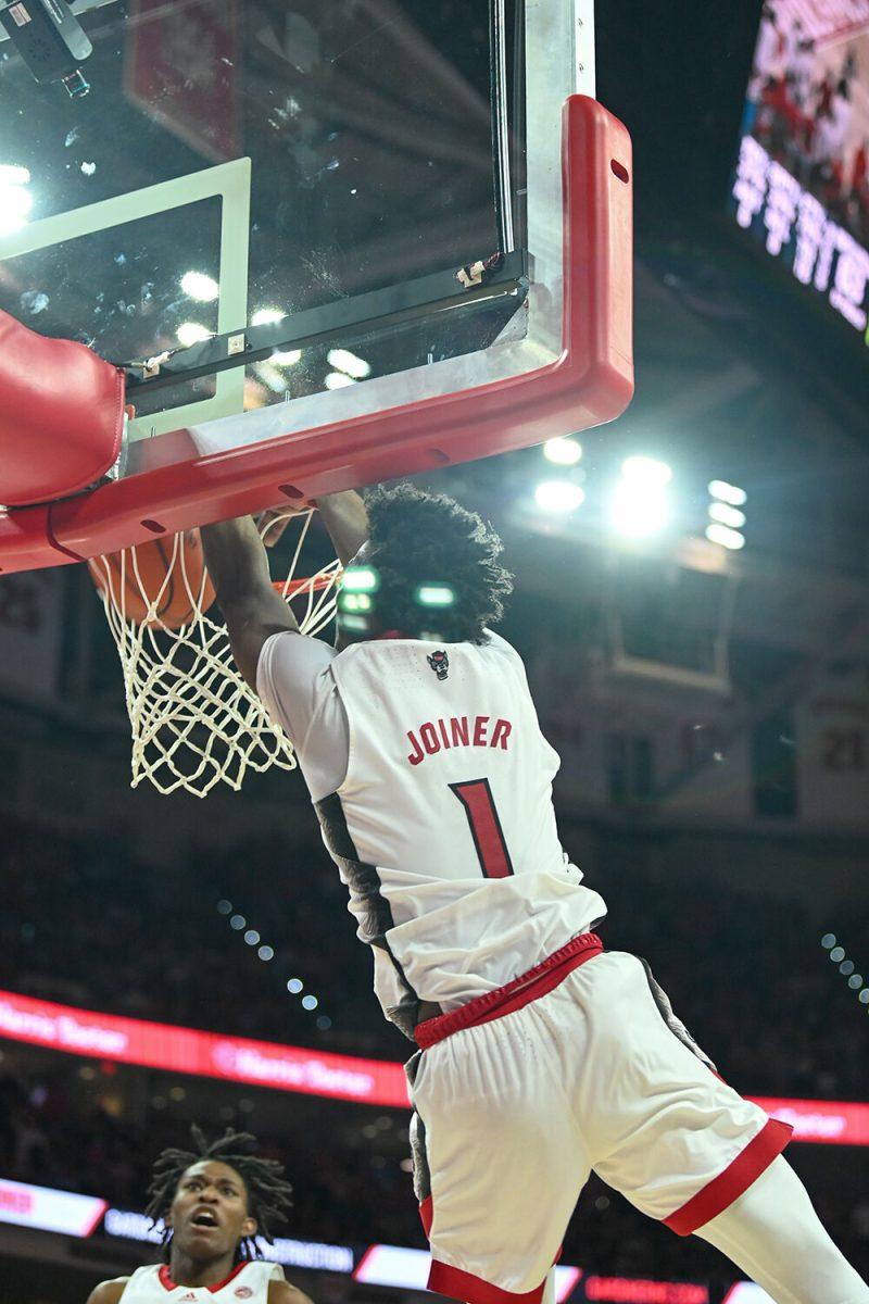 Graduate guard Jarkel Joiner dunks the ball during the game against UNC-Chapel Hill in PNC Arena on Sunday, Feb. 19, 2023. Joiner had 29 points for NC State. The Wolfpack beat the Tar Heels 77-69.