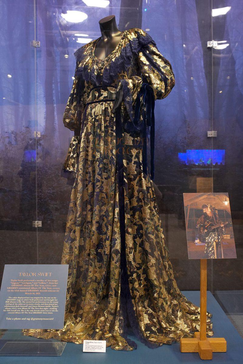The dress worn by Taylor Swift during her 2021 Grammy performance on display in The Power of Women in Country Music exhibit at the NC Museum of History on Friday, Feb. 3, 2023. The exhibit features four notable dresses worn by Swift throughout her career, as well as boots, a banjo and a set recreation from that 2021 Grammy's performance.