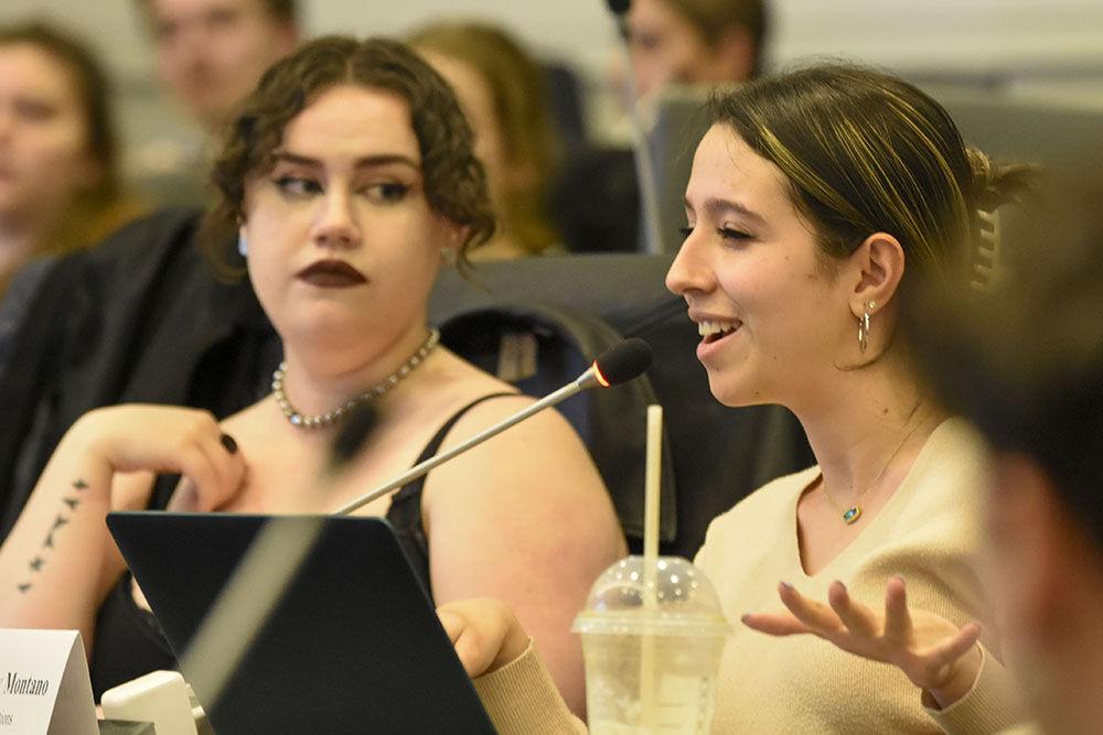 Marlee Charlton (left), a 4th year studying political science, watches as Maria Echeverny Montano, a 3rd year studying political science, discusses the procedures behind the Senator Onboarding Form at the 102nd Session of the North Carolina State University Student Senate at Talley Student Union on Wednesday, Feb. 1st 2023. Maria commented after the meeting that this was the longest she has ever talked in session, due to that she was a committee chair, not a senator.