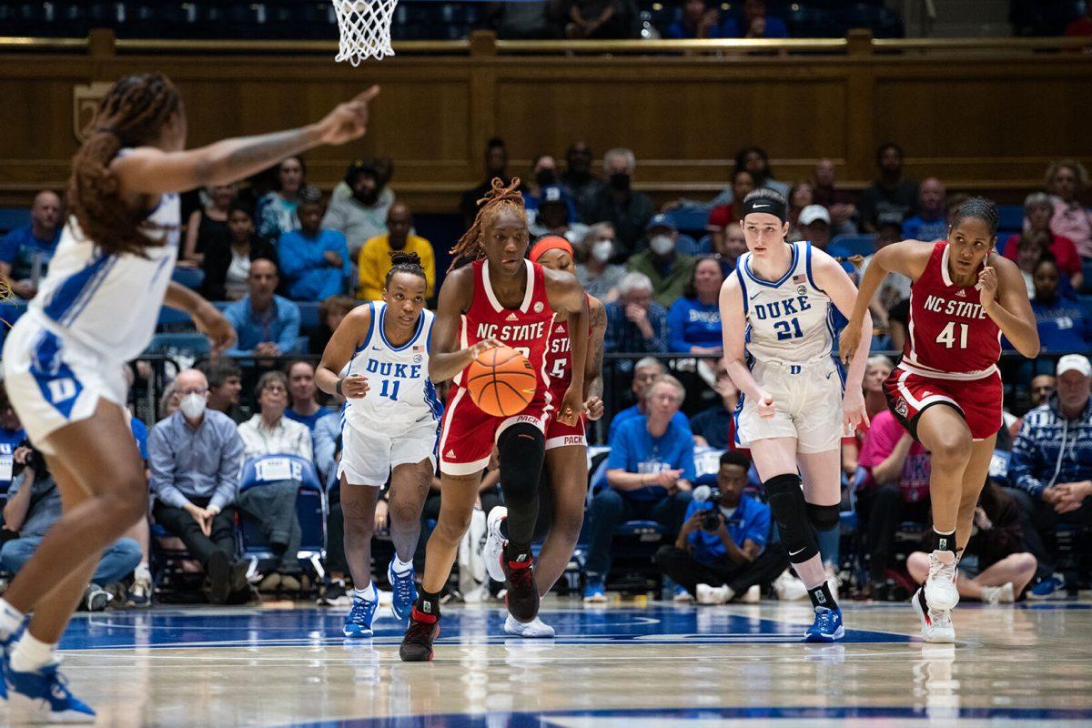 Sophomore Guard Saniya Rivers runs with the ball during the game versus Duke at Cameron Indoor Stadium on Feb. 23, 2023. Rivers three field-goals and one three-pointer. NC State lost to Duke 77-62.