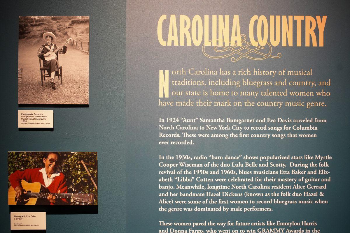 A sign highlights a variety of North Carolina connections in The Power of Women in Country Music exhibit at the NC Museum of History on Friday, Feb. 3, 2023.