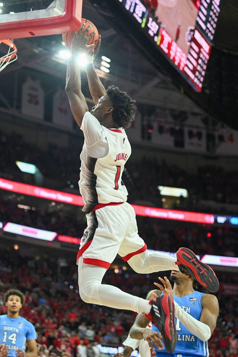 Graduate guard Jarkel Joiner dunks the ball during the game against UNC-Chapel Hill in PNC Arena on Sunday, Feb. 19, 2023. Joiner had 29 points for NC State. The Wolfpack beat the Tar Heels 77-69.