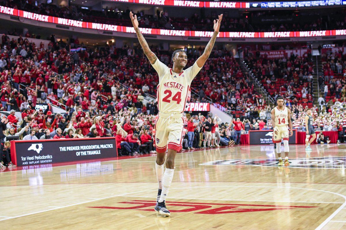 Sophomore forward Ernest Ross celebrates the Wolfpack win over the Georgia Tech Yellow Jackets at PNC Arena on Saturday, Feb. 4, 2023. Ross scored 16 points against Georgia Tech. The Wolfpack beat the Yellow Jackets 72-64.
