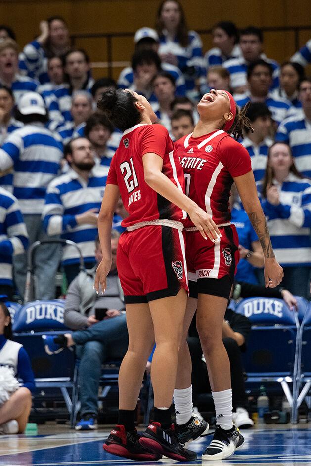 Junior guard Madison Hayes and sophomore guard Aziaha James celebrate after scoring during the game versus Duke at Cameron Indoor Stadium on Feb. 23, 2023. Hayes made two field-goals and James made two. NC State lost to Duke 77-62.