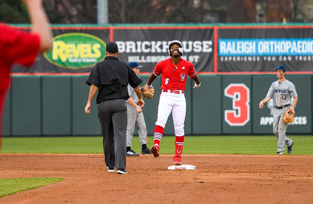 Sophomore infielder LuJames Groover III dances after hitting a double in the game against Longwood on Wednesday, Feb. 23, 2022 at Doak Field. Groover III went 3 for 6 during the game. NC State beat Longwood 19-3.