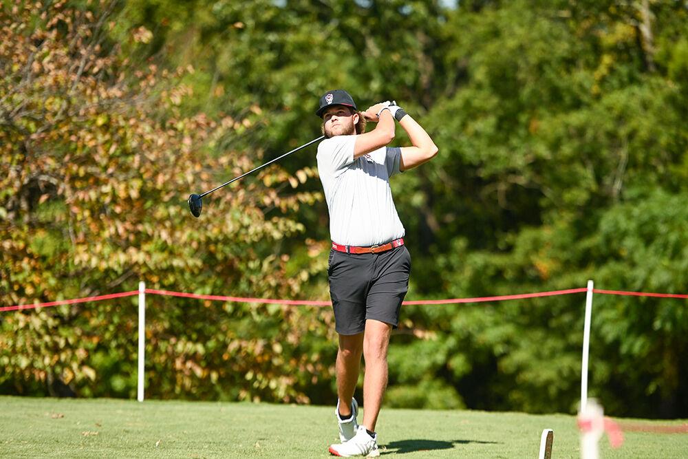 Redshirt sophomore Jake Herring drives the golf ball during the Wolfpack Intercollegiate at the Lonnie Poole Golf Course on Saturday, Oct. 15, 2022. Herring tied for 63rd in the tournment and was 12-over par. NC State tied for second.