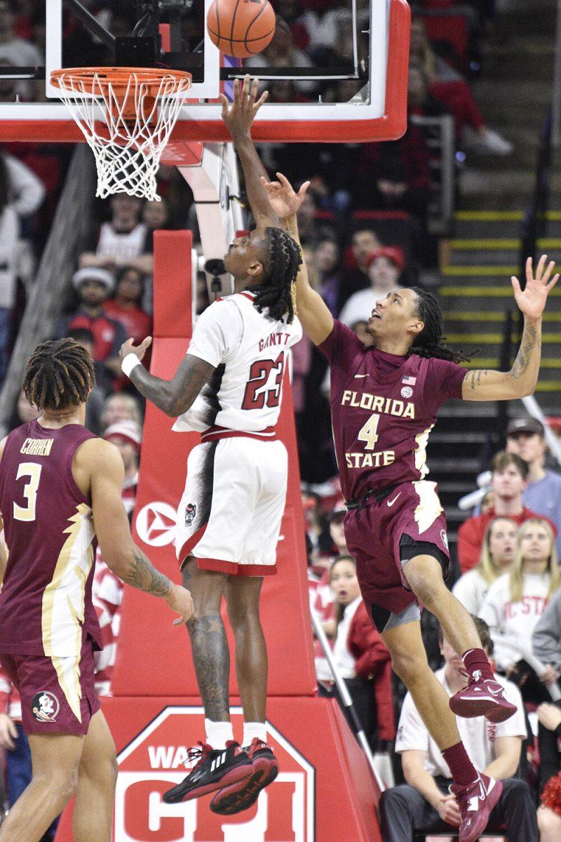 Redshirt junior forward Greg Gantt Ernest performs a layup during the game against the Florida State Seminoles inside PNC Arena on Wednesday, Feb. 1, 2023. Gantt scored five points with six rebounds. The Wolfpack won 94-66.