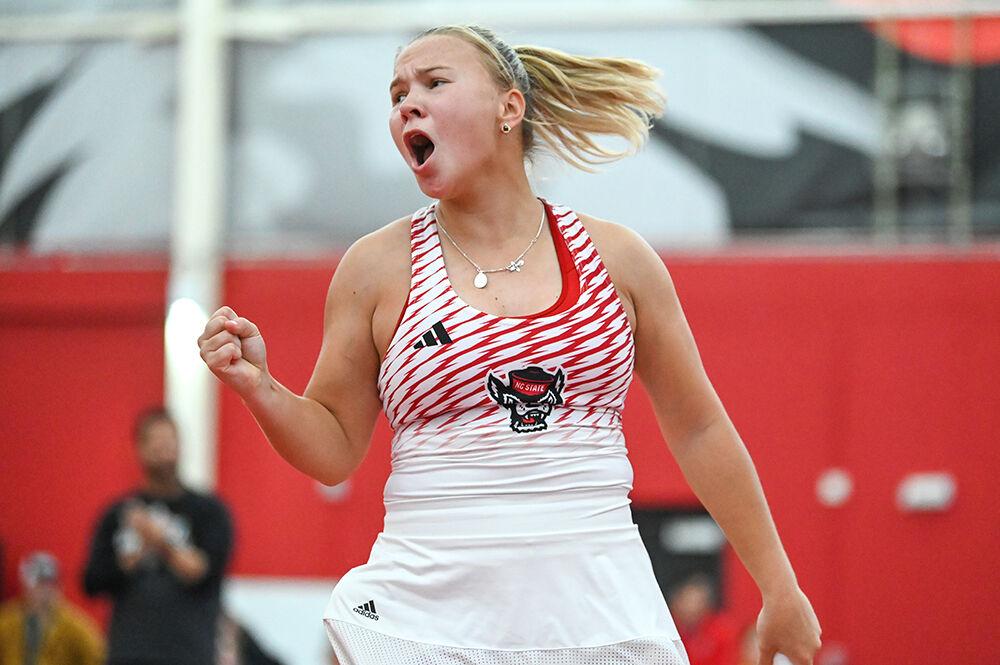 Freshman Diana Shnaider celebrates after a set versus Tennessee at J.W. Isenhour Tennis Center on Sunday, Feb. 5, 2023. Shnaider won her singles match and NC State beat Tennessee 6-1.