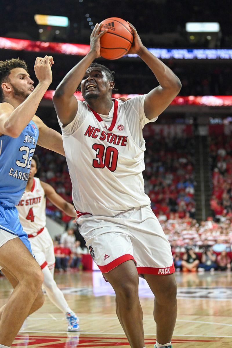 Graduate forward DJ Burns shoots the ball during the game against UNC-Chapel Hill in PNC Arena on Sunday, Feb. 19, 2023. Burns had 18 points for NC State. The Wolfpack beat the Tar Heels 77-69.