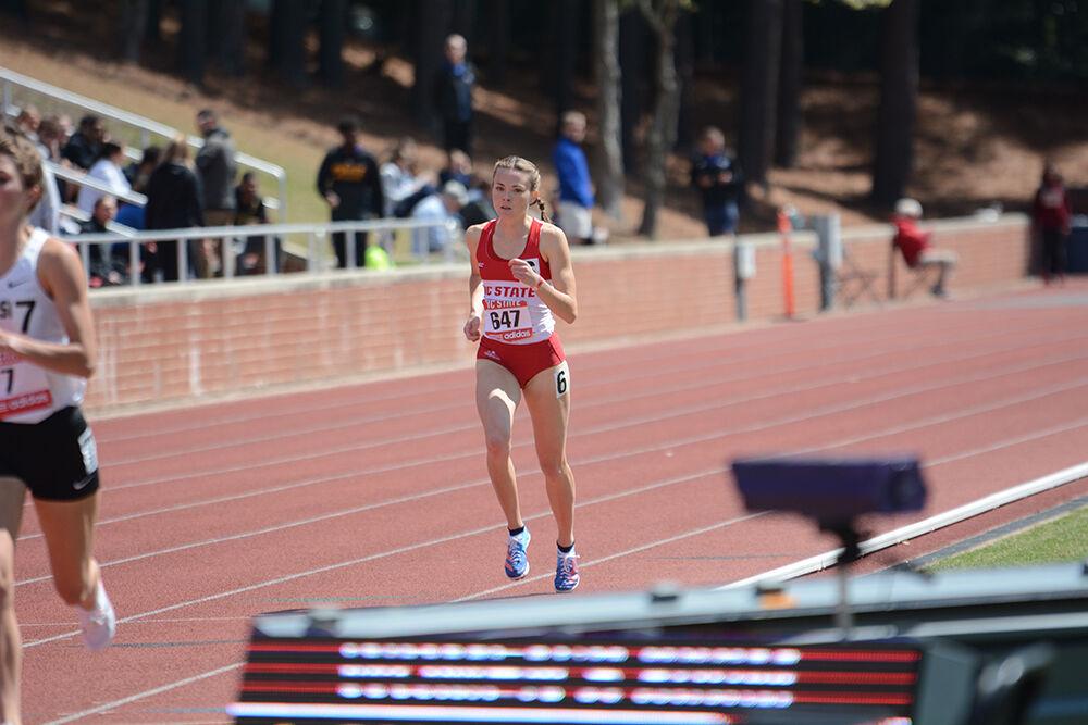 Junior Caroline Lewis runs the 800 meter at the Raleigh Relays at Paul Derr Track on Saturday, March 26, 2022. Lewis finished 10th in her heat.