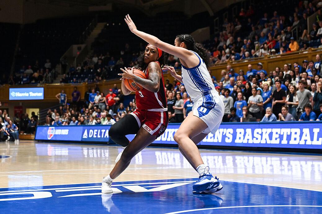 Senior forward Jada Boyd bypasses defender during the game versus Duke at Cameron Indoor Stadium on Feb. 23, 2023. Boyd made five field-goals and nine free-throws. NC State lost to Duke 77-62.
