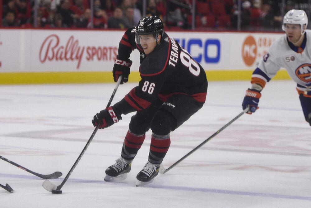 Left wing Teuvo Teravainen takes the puck up the ice during the game against the New York Islanders in PNC Arena on Friday, Oct. 28, 2022. Teravainen had one takeaway. The Hurricanes lost 6-2.