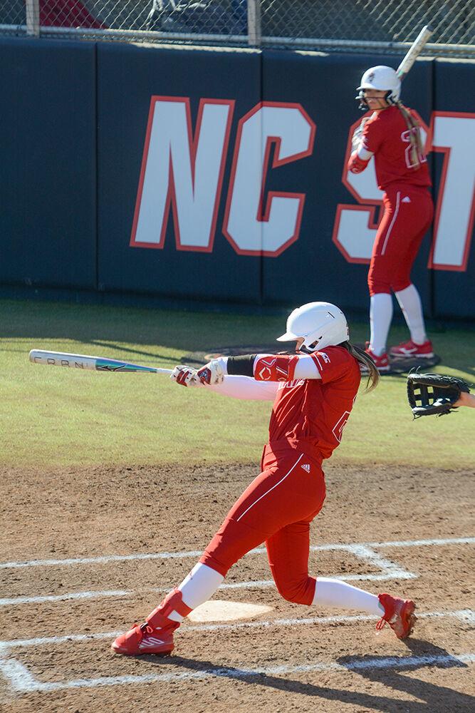 Graduate outfielder Katlyn Pavlik swings at bat during the game versus Iowa at Dail Softball Stadium on Saturday, Feb, 18, 2023. Pavlik had one run, one hit and two walks during the game. NC State beat Iowa 3-1.