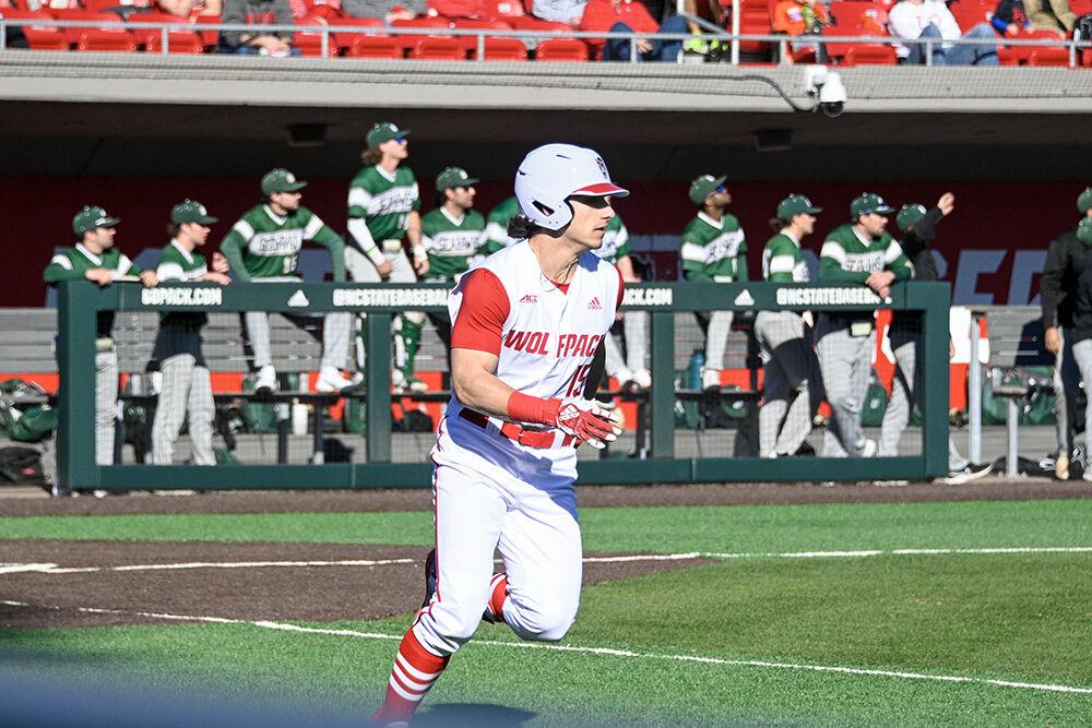 Junior outfielder Carter Trice heads to first base during the game against Wagner at Doak Field in Dail Park on Saturday, Feb 18, 2023. Trice had one run against Wagner. NC State beat Wagner 3-2 to win the series.